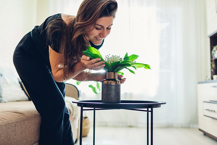 Woman enjoying a fresh, clean living room